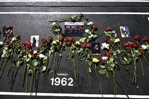 Flowers and photos on the scene of a shooting on the campus of the Elizabeth City State University in Elizabeth City, N.C.