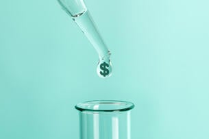 A photo illustration of a dropper dropping a single drop, with a dollar sign on it, into a beaker.