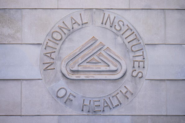 National Institutes of Health logo on building