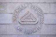 National Institutes of Health logo on building