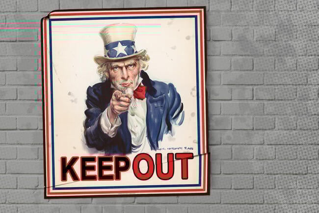 A poster of Uncle Sam with "keep out" on it in bold capital letters.